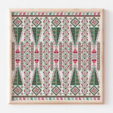 A Palestinian needlework of geometric Christmas shapes stitched in repeating columns in red and green