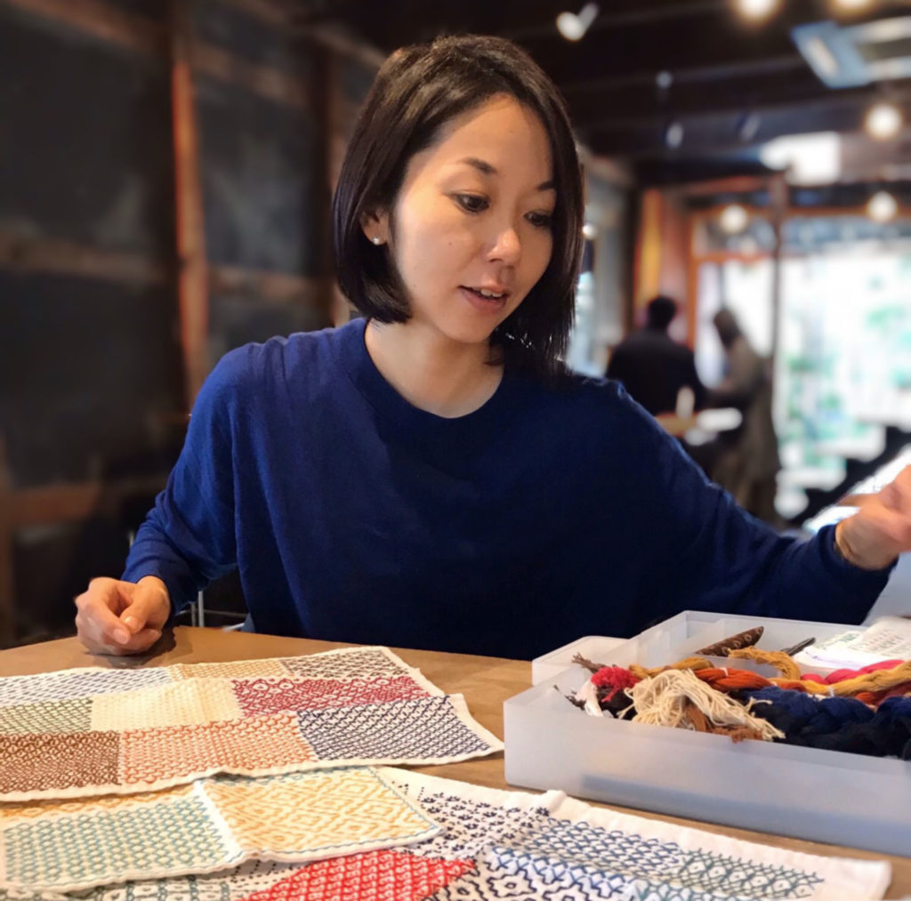 Embroidery artist Kazue Yoshikawa demonstrating sashiko