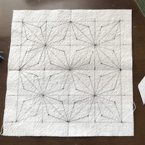 Kaku Asanoha pattern by Sashiko Lab drawn on fabric