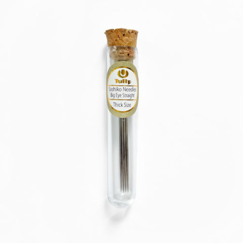 4 thick sashiko needles in a cork-topped test tube