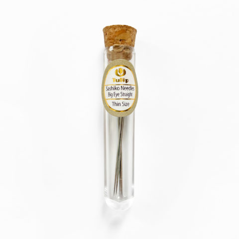 4 thin sashiko needles in a cork-topped test tube