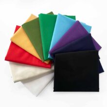 american made cotton quilting solid fabrics arranged in a rainbow fan