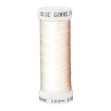 a spool of white silk thread on a white background