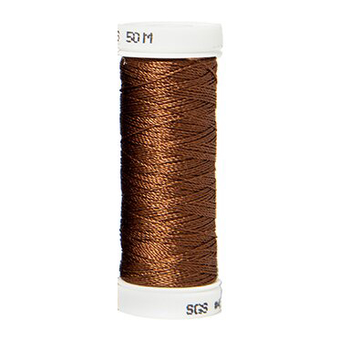 a spool of brown silk thread on a white background