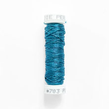 au ver a soie perlee blue silk embroidery thread 703 on spool