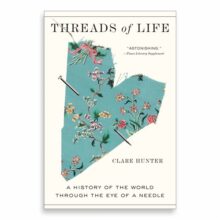 Threads of Life book cover showing floral fabric torn into a heart shape with a needle speared through it