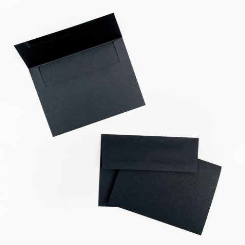 two black recycled a7 folded blank notecards with envelopes