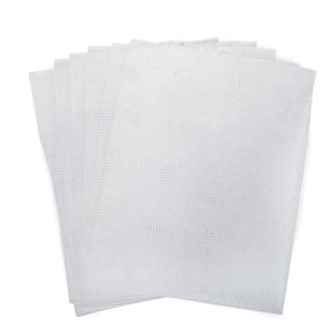 clear plastic canvas sheets fanned out on a white background
