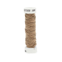 A spool of filament fine silk gimp 6265 Partridge brown on a white background