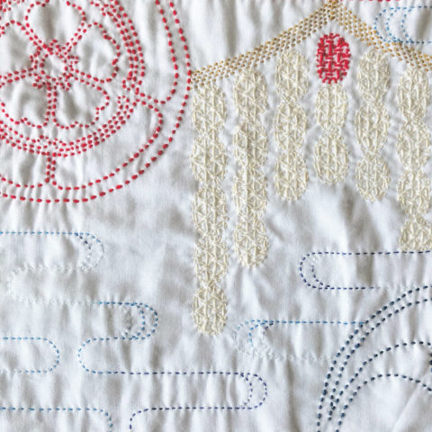 gion matsuri sashiko embroidery on white fabric by sashiko lab