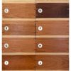 a stack of twelve hardwood keepsake boxes with contrasting lids shown from the front