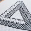 closeup of an impossible penrose triangle blackwork embroidery on white fabric