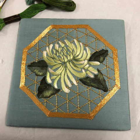 japanese mum flower silk embroidery on green grey background