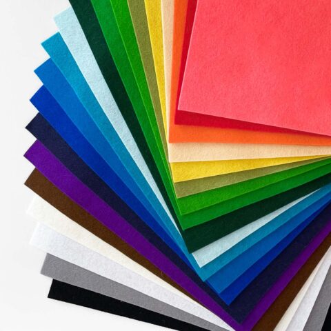 20 solid colored felt sheets arranged in a rainbow fan