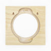 The back of a square blond wood hoop frame showing the spaces to insert the embroidery hoop and nails for hanging