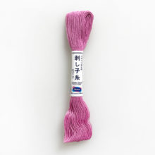 A skein of olympus sashiko cotton thread in lavender