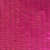 Rows of fuchsia sequins overlapping like fish scales