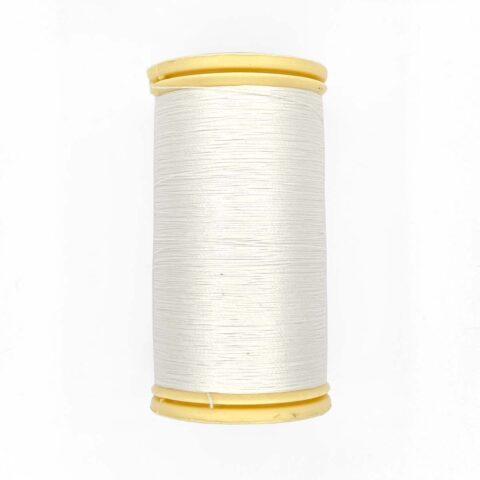 spool of sajou fil a gant au chonois waxed cotton gloving thread 100 white