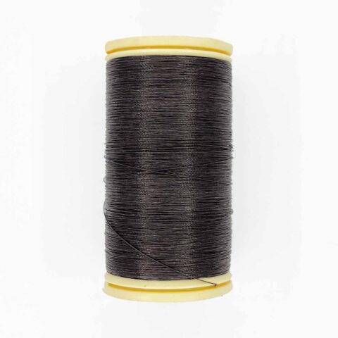 spool of sajou fil a gant au chonois waxed cotton gloving thread 190 slate