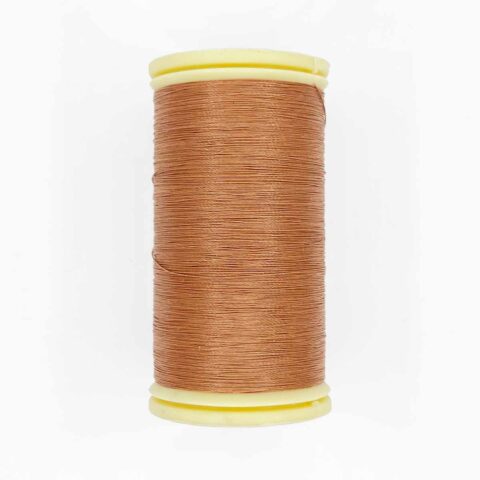 spool of sajou fil a gant au chonois waxed cotton gloving thread 217 chestnut