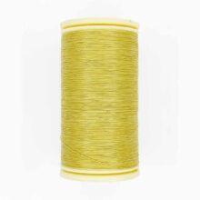 spool of sajou fil a gant au chonois waxed cotton gloving thread 330 butter