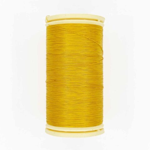 spool of sajou fil a gant au chonois waxed cotton gloving thread 361 straw