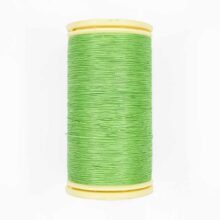 spool of sajou fil a gant au chonois waxed cotton gloving thread 808 aqua green
