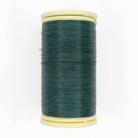 spool of sajou fil a gant au chonois waxed cotton gloving thread 895 holly