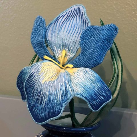 a blue stumpwork silk embroidered iris