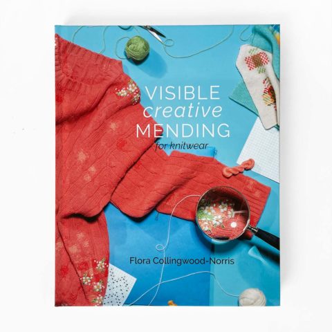 visble creative mending for knits book cover showing a red sweater repaired with embroidered daisies on a blue background
